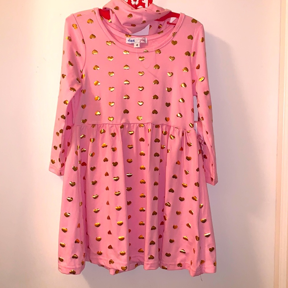 Pink dress with gold hearts.